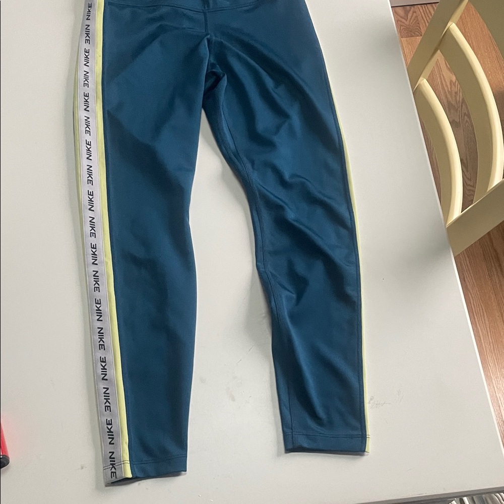Nike Women’s Blue Leggings with Side Stripe Waist across 12”, Length 32”